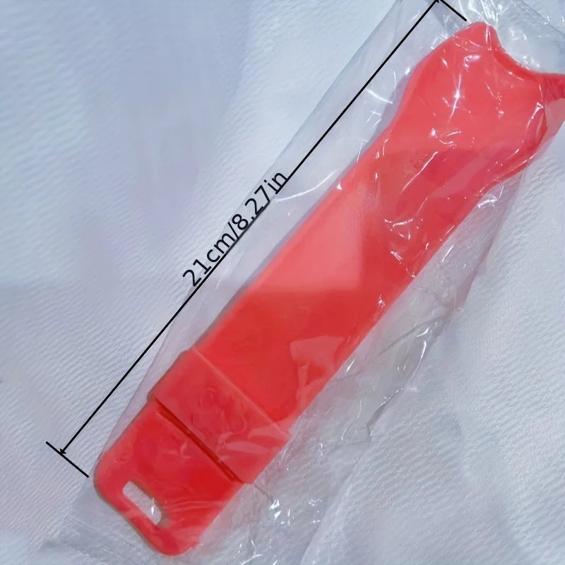 Cat Strip Squeeze Spoon holding pet food packet, designed for easy feeding with a comfortable grip.
